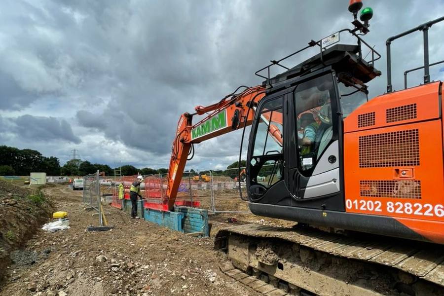 Tracked 360 excavator working on a groundworks site